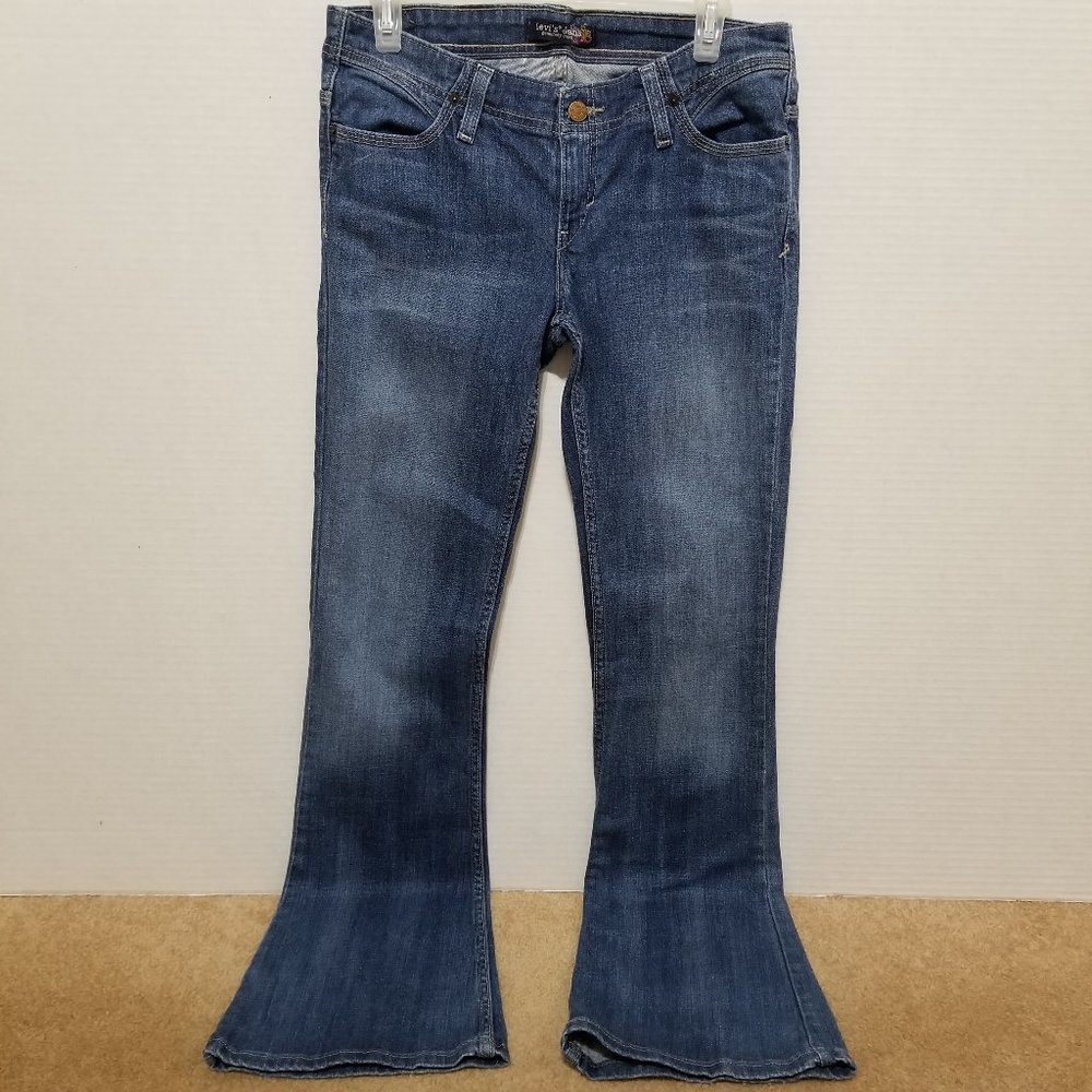 Levi's jeans 9M floral embroidered pockets boot cut denim boho whiskered stretch